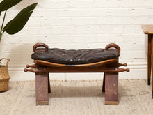Load image into Gallery viewer, Vintage Leather Saddle Stool with Tufted Seat and Sculptural Wood Frame as found
