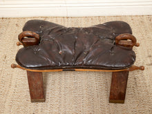 Load image into Gallery viewer, Vintage Leather Saddle Stool with Tufted Seat and Sculptural Wood Frame as found
