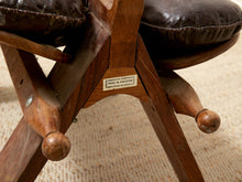 Load image into Gallery viewer, Vintage Leather Saddle Stool with Tufted Seat and Sculptural Wood Frame as found

