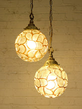 Load image into Gallery viewer, Pair of Vintage Faceted Glass Globe Pendant Lights with Ornate Brass Caps
