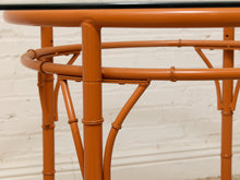 Load image into Gallery viewer, Vintage Bamboo-Style Orange Round Dining Table with Glass Top
