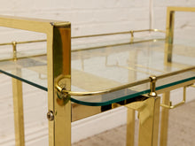 Load image into Gallery viewer, Vintage Hollywood Regency Brass Bar Cart with Glass Shelves
