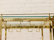 Load image into Gallery viewer, Vintage Hollywood Regency Brass Bar Cart with Glass Shelves
