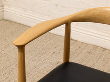 Load image into Gallery viewer, Modern Sculptural Oak Horseshoe Armchair with Black Seat
