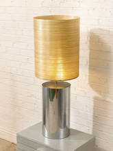 Load image into Gallery viewer, Chrome Cylinder Table Lamp with Tall Gold Grasscloth Shade

