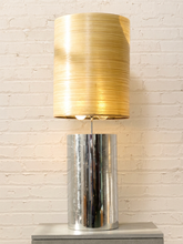 Load image into Gallery viewer, Chrome Cylinder Table Lamp with Tall Gold Grasscloth Shade
