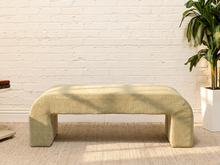 Load image into Gallery viewer, Pale sage upholstered waterfall bench with rounded corners, low profile, and continuous fabric-covered sides.
