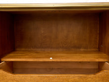 Load image into Gallery viewer, Close-up of an empty wooden storage cabinet or shelf unit with a medium brown wood grain finish and a single shelf divider.
