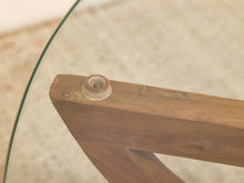Load image into Gallery viewer, Close-up of a wooden table leg with a round glass insert and screw base, set against a neutral beige background.
