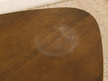 Load image into Gallery viewer, Close-up of a dark brown wooden surface with visible grain and a faint circular scuff or mark on the top.
