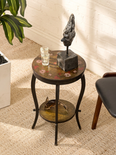 Load image into Gallery viewer, Vintage round two-tier side table with hand-painted floral top, decorative lower shelf, and dark curved legs.
