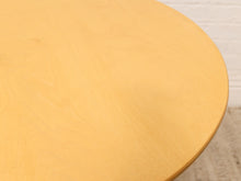Load image into Gallery viewer, Close-up of a light natural wood circular tabletop surface with visible grain, photographed against a pale neutral background.
