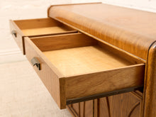 Load image into Gallery viewer, Close-up of a wooden writing desk with two open drawers showing light wood interiors and dark metal drawer pulls.
