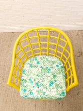 Load image into Gallery viewer, Image 9 of 20: Set of four vintage bright yellow rattan barrel chairs with floral cushions, alternate view 4
