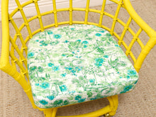 Load image into Gallery viewer, Image 13 of 20: Set of four vintage bright yellow rattan barrel chairs with floral cushions, alternate view 8
