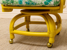 Load image into Gallery viewer, Image 19 of 20: Set of four vintage bright yellow rattan barrel chairs with floral cushions, alternate view 14

