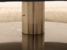 Load image into Gallery viewer, A close-up of a brushed metal cylindrical stand or post, showing a brushed silver/chrome finish with a small scratch on the side, resting on a reflective metallic surface.
