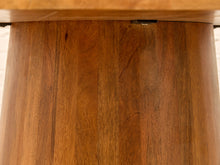 Load image into Gallery viewer, Close-up of a wooden table base with a warm medium-brown wood grain finish and a matching wooden tabletop edge visible at the top.
