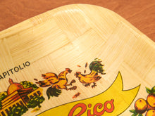Load image into Gallery viewer, A close-up of a light natural wood tray with a printed graphic featuring two roosters, oranges, and part of the word 'Pico' on a yellow banner.
