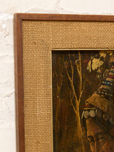 Load image into Gallery viewer, A close-up of a framed vintage painting showing a textured burlap mat, a dark brown wooden frame, and part of the painted scene depicting a figure in a forest.
