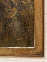 Load image into Gallery viewer, Close-up of a framed artwork showing a dark brown and black painted scene with a textured tan burlap-style border and a medium brown wooden frame, mounted on a white painted brick wall.
