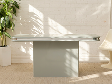Load image into Gallery viewer, Vintage gray Streamline Moderne console table with rounded rectangular top, chrome trim, and central pedestal base
