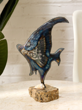 Load image into Gallery viewer, Brutalist metal angelfish sculpture with iridescent blue and bronze patina on a natural stone base

