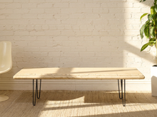 Load image into Gallery viewer, Vintage rectangular travertine stone coffee table with cream and beige natural veining and dark metal hairpin legs
