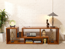 Load image into Gallery viewer, Vintage mid-century modern wood console with asymmetrical open shelving, recessed center compartment, and lower storage cubbies
