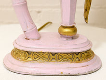 Load image into Gallery viewer, A close-up of a vintage-style pink and gold decorative object, showing a round pink base with a gold patterned band and matching pink legs against a light neutral background.
