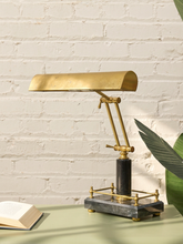 Load image into Gallery viewer, Vintage brass and black adjustable banker’s desk lamp with elongated shade, articulated twin-arm support, and rectangular base
