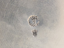 Load image into Gallery viewer, Close-up of a silver-toned metal surface showing a circular stamped 'B' monogram and a smaller crown-and-letter mark, likely indicating brand or maker markings.
