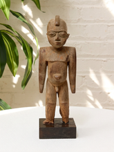 Load image into Gallery viewer, Vintage hand-carved wooden standing figure with expressive face, raised head crest, elongated body, and rectangular base
