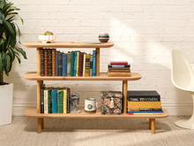 Load image into Gallery viewer, Handmade three-tier pine display shelf with staggered rounded wood shelves and cylindrical supports
