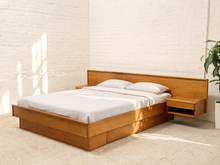 Load image into Gallery viewer, Vintage Danish Modern teak floating platform bed with integrated nightstands, extended headboard, and wood slat base
