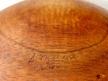 Load image into Gallery viewer, Close-up of a polished wooden surface with visible grain and an engraved signature reading 'S. Molari Vee'.
