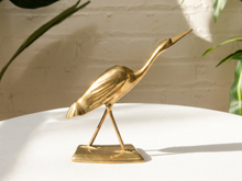 Load image into Gallery viewer, Vintage brass heron bird sculpture with long neck and slender legs on rectangular base
