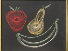 Load image into Gallery viewer, A framed abstract fruit artwork on a dark background, featuring a red apple-like shape, a yellow pear-like shape, and curved green and white banana-like lines.
