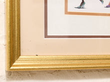 Load image into Gallery viewer, Close-up of a framed art print showing a textured gold frame, cream matting, and a partial fashion illustration of high-heeled shoes.
