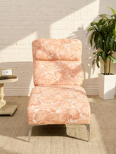 Load image into Gallery viewer, Vintage chaise lounge with peach and cream palm leaf upholstery, rounded back, and matching bolster cushion
