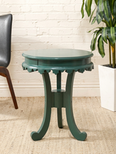 Load image into Gallery viewer, Vintage 1970s forest green round side table with layered top, scalloped apron, and curved legs
