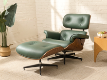 Load image into Gallery viewer, Deep green leather iconic lounge chair and matching tufted ottoman with metal bases
