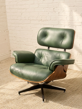 Load image into Gallery viewer, Deep green leather iconic lounge chair and matching tufted ottoman with metal bases
