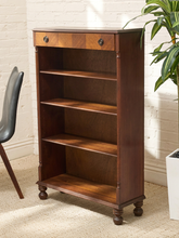Load image into Gallery viewer, Antique tall wood bookshelf with four open shelves, upper drawer, round metal pulls, and turned front feet
