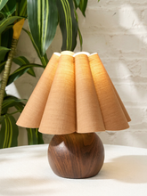Load image into Gallery viewer, Small vintage table lamp with rounded wood base and pleated brown fabric shade
