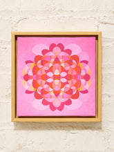 Load image into Gallery viewer, Vintage pink kaleidoscope geometric artwork with overlapping circular pattern in magenta, lavender, red, and orange in wood frame
