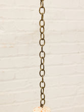 Load image into Gallery viewer, Vintage ceramic hanging bird feeder with cream glaze, orange-red speckles, open feeding area, and metal chain
