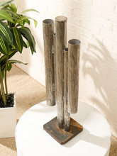 Load image into Gallery viewer, Brutalist welded steel sculpture with vertical tubular pipes of varying heights on a square metal base
