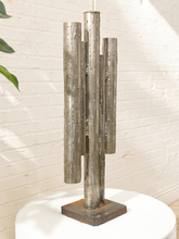 Load image into Gallery viewer, Brutalist welded steel sculpture with vertical tubular pipes of varying heights on a square metal base
