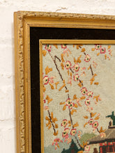Load image into Gallery viewer, Vintage framed needlepoint artwork depicting a red pagoda, flowering tree branches, blue water, and distant mountains.
